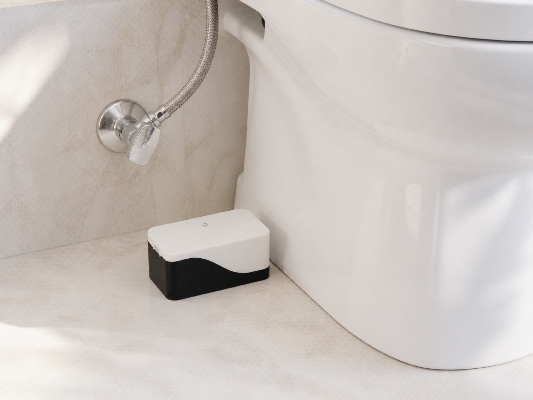 Smart Leak Sensor: leak detector behind toilet